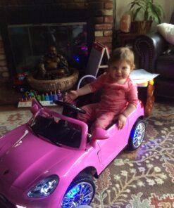 Moderno Kids Kiddie Roadster 12V Power Children Ride-On Car with R/C Parental Remote + Leather Seat 5 Point Seat Belt + LED Wheels + MP3 USB Music Player + Baby Tray Table + Rubber Floor Mats (Pink) Pink 59 81DYNyHPfbL