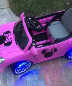 Moderno Kids Kiddie Roadster 12V Power Children Ride-On Car with R/C Parental Remote + Leather Seat 5 Point Seat Belt + LED Wheels + MP3 USB Music Player + Baby Tray Table + Rubber Floor Mats (Pink) Pink 55 81Dxg8lwxYL