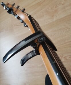 Guitar Capo Deluxe for Guitars, Ukulele, Banjo, Mandolin, Bass -Made of Premium Quality Zinc Alloy for 6 & 12 String Instruments- Luxury Accessories Nordic Essentials&trade- (Black) Sleek Metallic Black 18 81EqS8rlqYL