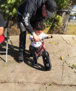 Strider 12” Classic Bike - No Pedal Balance Bicycle for Kids 18 Months to 3 Years - Includes Built-In Footrest, Handlebar Grips & Flat-Free Tires Strider Red 17 81JlDQWRxTL