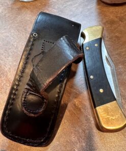 Buck Knives 110 Folding Hunter Lock-back Knife, Brass Bolsters, Ebony Handles, 3-3/4" 420HC Blade with Leather Sheath Classic 3.75" 53 81P2Y2bU8KL