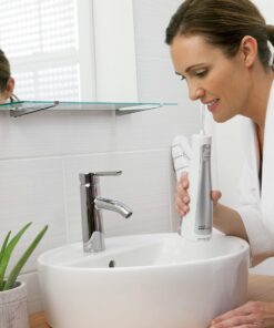 Waterpik Water Flosser Cordless Dental Oral Irrigator for Teeth with Portable Travel Bag and 3 Jet Tips, Cordless Freedom ADA Accepted, WF-03, White 16 81PcFT7nfL