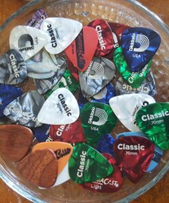 D'Addario Celluloid Guitar Picks - Guitar Accessories - Guitar Picks for Acoustic Guitar, Electric Guitar, Bass Guitar - Natural Feel, Warm Tone - Assorted, Medium 0.70mm, 25-pack 0.70mm-Medium 11 81Q4E418m L