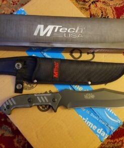 MTech USA – Fixed Blade Knife – Black Stainless Steel Blade with Black Carved G10 Handle, Full Tang, Includes 1680D Nylon Sheath - Hunting, Camping, Survival, Tactical, EDC – MT-20-39 44 81Y7ZzsPwuL