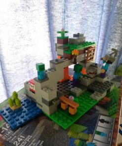 LEGO Minecraft The Zombie Cave 21141 Building Kit with Popular Minecraft Characters Steve and Zombie Figure, separate TNT Toy, Coal and more for Creative Play for 84 months to 168 months (241 Pieces) 21 81cvIDRWDIL