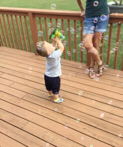 Dinosaur Bubble Gun Light Up Bubbles Shooter, Battery Operated Bubble Maker Toy for Toddlers & Kids, Sound-Free (Extra Refill Bottle and Batteries Included) Green Dinosaur 34 81dmGUc3ayL