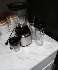 Hamilton Beach Stay or Go Blender with 32oz Jar, 8oz Grinder for Nuts & Spices, and 2 Portable Cups with Drinking Lids for Shakes and Smoothies, BPA Free, Black and Silver (52400) 26 91KcTQiQJkL