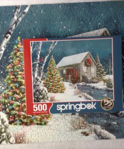 Alternative view of Springbok The Falling Snow 500 Piece Jigsaw Puzzle for Adults Features a Holiday Cabin Glowing in The Snow with a Decorated Christmas Tree Beside it