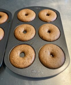 Wilton 6-Cavity Doughnut Baking Pan, Makes Individual Full-Sized 3 3/4" Donuts or Baked Treats, Non-Stick and Dishwasher Safe, Enjoy or Give as Gift, Metal (1 Pan) 1 Pack Wilton Nonstick 6-Cavity Donut Pan 38 91v8iHuJKL