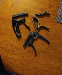 D'Addario Accessories Guitar Capo – NS Tri Action - For 6-String Electric and Acoustic Guitars – Micrometer Tension Adjustment for Buzz-Free, In-Tune Performance – Integrated Pick Holder, Black (PW-CP-09) Tri-Action Capo 23 A1UKKBksG6L