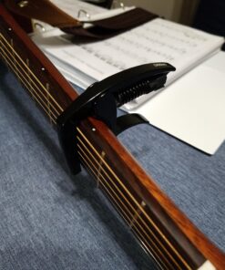 D'Addario Accessories Guitar Capo – NS Tri Action - For 6-String Electric and Acoustic Guitars – Micrometer Tension Adjustment for Buzz-Free, In-Tune Performance – Integrated Pick Holder, Black (PW-CP-09) Tri-Action Capo 26 A1USMJWrymL