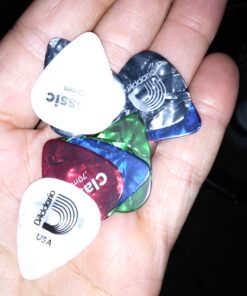 D'Addario Celluloid Guitar Picks - Guitar Accessories - Guitar Picks for Acoustic Guitar, Electric Guitar, Bass Guitar - Natural Feel, Warm Tone - Assorted, Medium 0.70mm, 10-pack 0.70mm-Medium 30 A1avzODoOqL