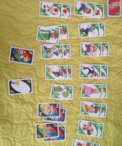 Mattel Games UNO Super Mario Card Game Animated Character Themed Collector Deck 112 Cards with Character Images, Gift for Kids Ages 7 Years Old & Up Small 32 A1jssANyPXL