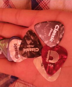 D'Addario Celluloid Guitar Picks - Guitar Accessories - Guitar Picks for Acoustic Guitar, Electric Guitar, Bass Guitar - Natural Feel, Warm Tone - Assorted, Medium 0.70mm, 10-pack 0.70mm-Medium 33 A1pkTbsFQ4L