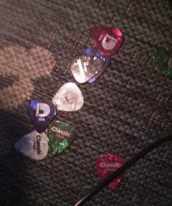 D'Addario Celluloid Guitar Picks - Guitar Accessories - Guitar Picks for Acoustic Guitar, Electric Guitar, Bass Guitar - Natural Feel, Warm Tone - Assorted, Medium 0.70mm, 10-pack 0.70mm-Medium 31 A1wtNOpIzTL