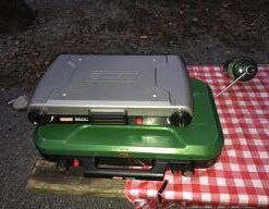 Coleman Classic 3-Burner Propane Camping Stove, Portable Camp Stove with 3 Adjustable Burners & Push-Button Instant Ignition, 28,000 BTUs for Camping, Tailgating, Grilling, BBQs, & More Green 38 31ipilmLlwL 3