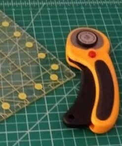 OLFA 45mm Ergonomic Rotary Cutter (RTY-2/DX) - Rotary Fabric Cutter w/ Blade Cover & Squeeze Trigger for Quilting, Sewing, Crafts, Replacement Blade: OLFA RB45-1H 45 41J2BlmgzHL
