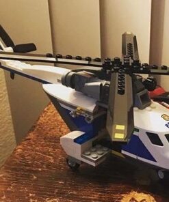 LEGO City Police High-Speed Chase 60138 Building Toy with Cop Car, Police Helicopter, and Getaway Sports Car (294 Pieces) 38 51IxUKQ1TUL