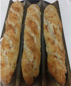 Chicago Metallic Commercial II Non-Stick Perforated Baguette Pan. Creates a crisp, golden-brown crust, 16 L x 9 W x 1.5 H 25 51SRb4vrkjL