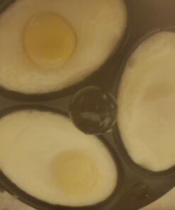 Hamilton Beach Electric Hard Boiled Egg Cooker, 3-in-1: Boiled Egg Cooker, Poacher & Omelet Maker, Can Hold 7 Eggs, Black with Silver Knob (25500) 46 612m5BaW7IL