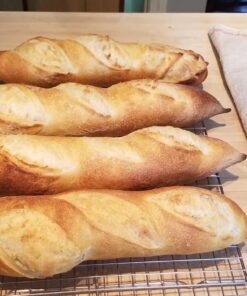 Chicago Metallic Commercial II Non-Stick Perforated Baguette Pan. Creates a crisp, golden-brown crust, 16 L x 9 W x 1.5 H 30 615SrI1ioL