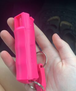 SABRE Pepper Spray, Supports National Breast Cancer Foundation, Maximum Police Strength OC Spray, Quick Release Keychain for Easy Carry and Fast Access, Finger Grip for More Accurate Aim, 25 Bursts Pink (1-Pack) 33 61Gikc0SO9L