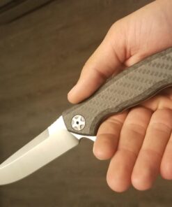 Zero Tolerance 0452CF; Pocket Knife with 4.1” Dual-Finished S35VN Steel Blade, Carbon Fiber Front and Titanium Back Handle Scales, KVT Ball-Bearing Opening, Frame Lock, Deep-Carry Pocketclip; 4.6 OZ.,Large 60 61GmmLEh5mL