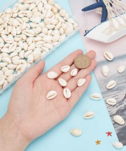 Alternative view of PH PandaHall 200-300 Pcs Tiny Cowrie Sea Shells Oval Ocean 9-12mm Beach Spiral Seashells Craft Charms for Bracelet Neckalce Jewelry Candle Making Home Decor Party Wedding Decor Fish Tank Vase Filler Length 9-12mm 200pcs