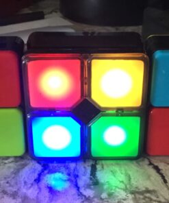 Flipslide Game - Electronic Handheld Game | Addictive Multiplayer Puzzle Game of Skill | Flip, Slide & Match Colors to Beat the Clock | 4 Thrilling Game Modes | Ages 8+ | Includes Batteries 34 61RvxJzBFXL