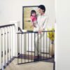 Toddleroo by North States 47.85" Wide Easy Swing & Lock Baby Gate - Series 1: Ideal for Wider Areas and stairways. Hardware Mount. Fits Openings 28.68" - 47.85" Wide (31" Tall, Matte Bronze) 77 61Tl0jyLZdL