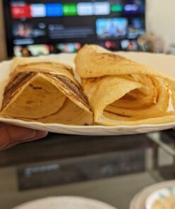 Lodge Cast Iron Round Griddle with Red Silicone Hot Handle Holder, 10.5-inch Round Griddle Bundle 21 61evTzqbbeL