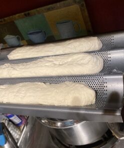 Chicago Metallic Commercial II Non-Stick Perforated Baguette Pan. Creates a crisp, golden-brown crust, 16 L x 9 W x 1.5 H 35 61n9oyp3QL