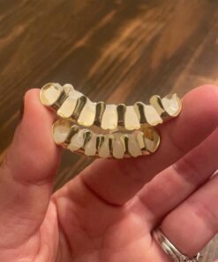 TOPGRILLZ Gold Grills for Your Teeth 18K Gold Plated Hip Hop Custom Fit Polished Teeth Grillz for Men and Women with 4 Silicon Molding Bars Rapper Costume Gold 6 Fangs 27 61rHCTOvNzL