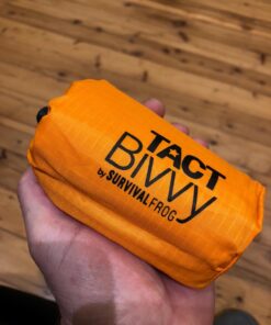Survival Frog Tact Bivvy 2.0 Emergency Sleeping Bag w/Stuff Sack, Carabiner, Survival Whistle, ParaTinder - Compact, Lightweight, Waterproof, Reusable, Thermal Bivy Sack Cover, Shelter Kit New 2.0 Tactical Orange 23 710uy9IJEQL