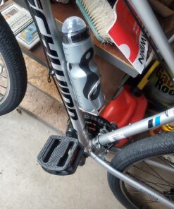 Schwinn Bike Bottle Holder With Water Bottle, 23 Oz. BPA-Free Squeeze Sport Bottle and Durable Alloy Cage, Easy To Mount Cycling Accessory 23 Ounces 44 712PcC0uM8L