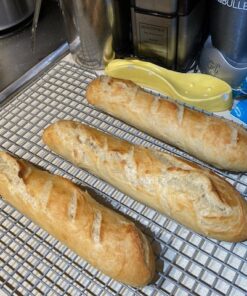 Chicago Metallic Commercial II Non-Stick Perforated Baguette Pan. Creates a crisp, golden-brown crust, 16 L x 9 W x 1.5 H 36 717Deo5i0dL