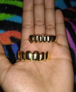 TOPGRILLZ Gold Grills for Your Teeth 18K Gold Plated Hip Hop Custom Fit Polished Teeth Grillz for Men and Women with 4 Silicon Molding Bars Rapper Costume Gold 6 Fangs 34 718v6jfw26L