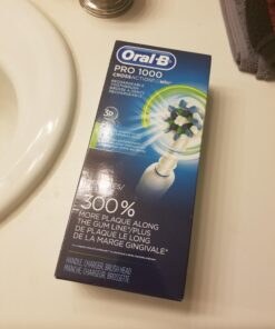 Oral-B Pro 1000 Rechargeable Electric Toothbrush, White Rechargeable Handle 48 71BNPG AVZL