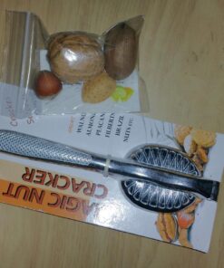 Magic Nutcracker Tool Works in Seconds. No Mess. Works on Walnuts, Almonds, Pecans, Hazelnuts. Great to Use As a Lemon Lime Squeezer. 59 71C8w29xJ2L