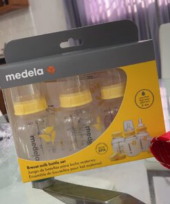 Medela Breast Milk Storage Bottles, 3 Pack of 5 Ounce Breastfeeding Bottles with Slow Flow Nipples, Lids, Wide Base Collars, and Travel Caps, Made Without BPA 3 Count (Pack of 1) 26 71DlYDI gpL