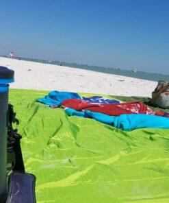 WEKAPO Beach Blanket Sandproof, Extra Large Beach Mat, Big & Compact Sand Free Mat Quick Drying, Lightweight & Durable with 6 Stakes & 4 Corner Pockets Green 9x10 FT (1~8 person) 25 71H 8Ko3KfL