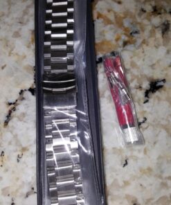 GUESS Stainless Steel Stain Resistant Silicone Watch with Day, Date + 24 Hour Military/Int'l Time Blue/Blue/Silver Tone 32 71HuiEbm6uL