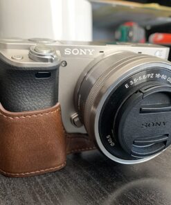 MegaGear "Ever Ready" Leather Camera Case – Easy to Install, Tripod and Peripheral Friendly Accessory – Compatible with Sony Alpha A6000, A6300 (Dark Brown) Dark Brown 32 71I btZZ nL