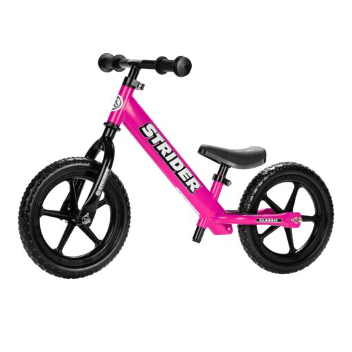 Strider 12” Classic Bike - No Pedal Balance Bicycle for Kids 18 Months to 3 Years - Includes Built-In Footrest, Handlebar Grips & Flat-Free Tires Pink