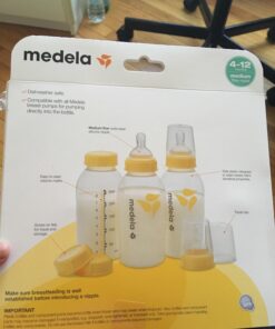 Medela Breast Milk Storage Bottles, 3 Pack of 5 Ounce Breastfeeding Bottles with Slow Flow Nipples, Lids, Wide Base Collars, and Travel Caps, Made Without BPA 3 Count (Pack of 1) 31 71S9DZfQnL