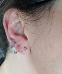 Rhodium Plated Sterling Silver Womans Tiny Skull Stud Earrings Rhodium Plated 39 71g1bpP8cWL