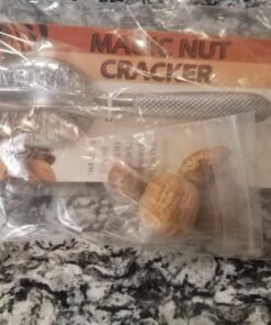 Magic Nutcracker Tool Works in Seconds. No Mess. Works on Walnuts, Almonds, Pecans, Hazelnuts. Great to Use As a Lemon Lime Squeezer. 65 71hUk0wehwL