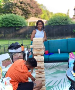 Yard Games Giant Tumbling Timbers with carrying case starts at 2.5-feet tall and builds to 5-feet 30 Inch Natural 36 71lx8POPftL