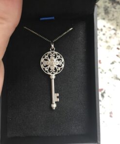 Jewelili Sterling Silver 1/10 Cttw Natural White Round Diamond Key Pendant Necklace, 18" Box Chain 13 71oEBKFa1TL