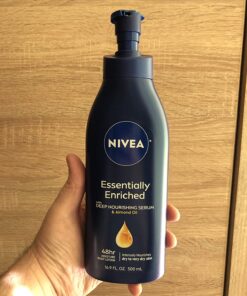 NIVEA Essentially Enriched Body Lotion,Dry to Very Dry Skin, 16.9 Fl Oz, Package may vary 16.9 Fl Oz (Pack of 1) 52 71rSeWkQPML